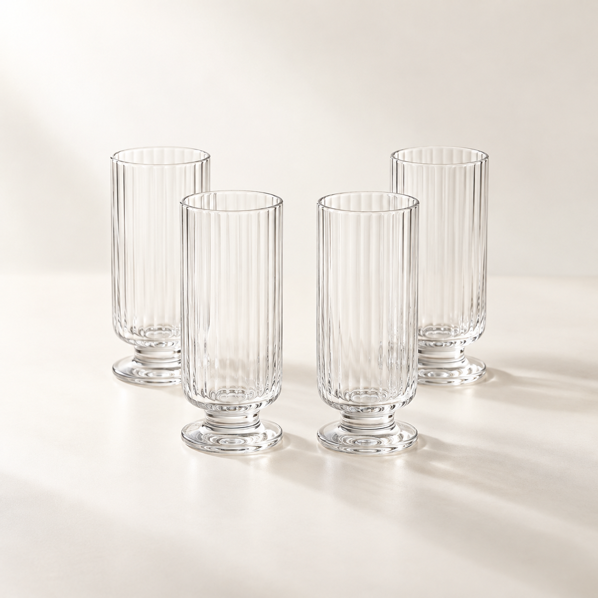 Solis Footed Flute Glass Set - complete set of 4 clear glass cups
